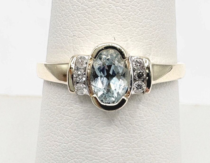 10KY AQUAMARINE WITH DIAMOND ACCENTS RING SIZE 7.75