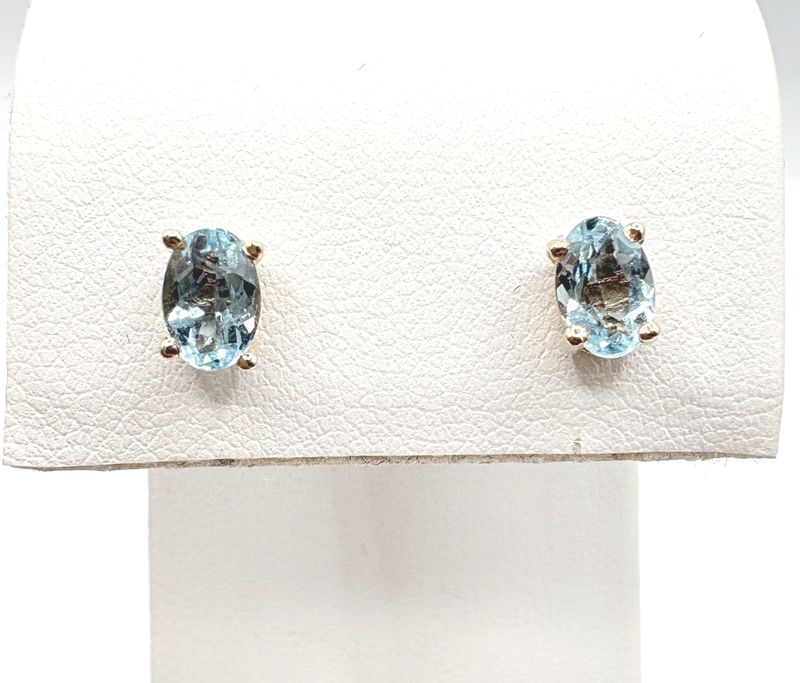 14KY BLUE TOPAZ OVAL 4X6MM STUD EARRING