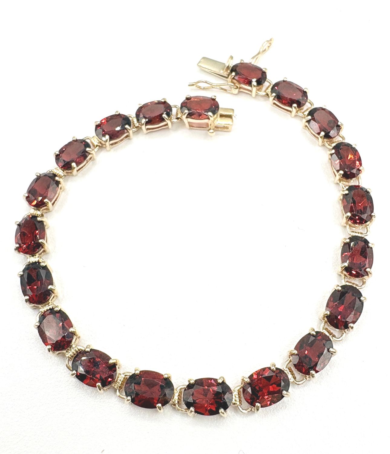 10KY GARNET TENNIS BRACELET 7.5"