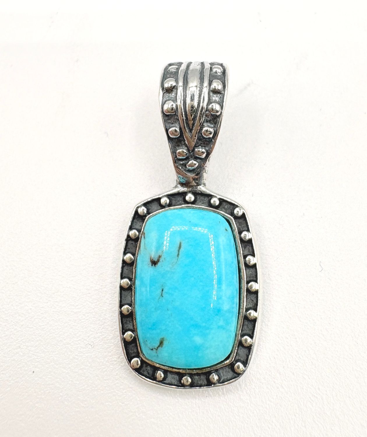 STERLING TURQUOISE CABOCHON WITH BAIL THAT OPENS PENDANT