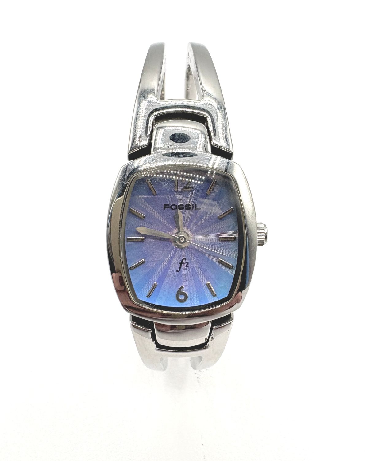 WOMAN'S SILVER TONE BANGLE WATCH WITH PURPLE /BLUE FACE