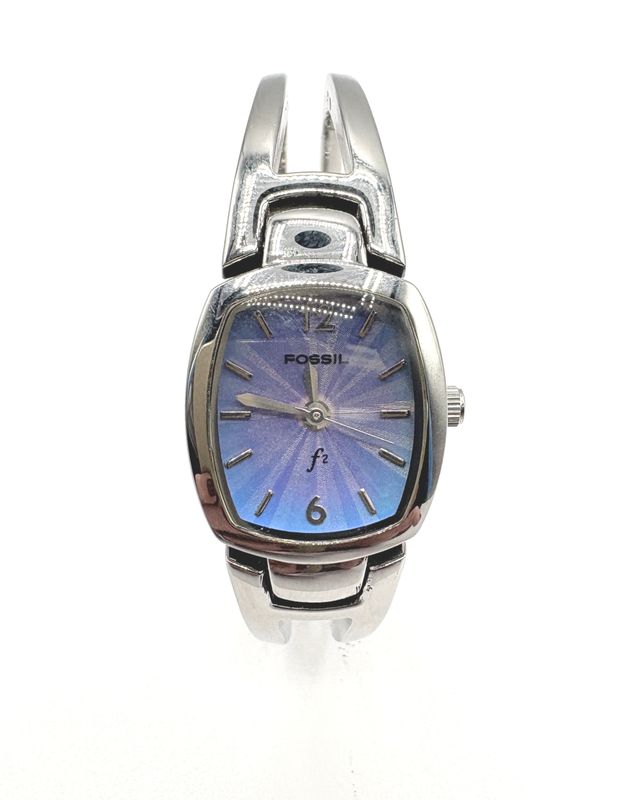 WOMAN'S SILVER TONE BANGLE WATCH WITH PURPLE /BLUE FACE