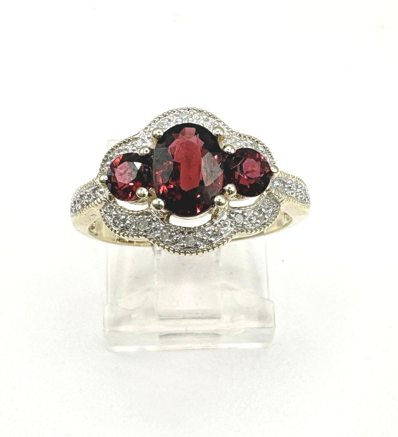 10KY GARNET WITH DIAMOND HALO RING SIZE 7