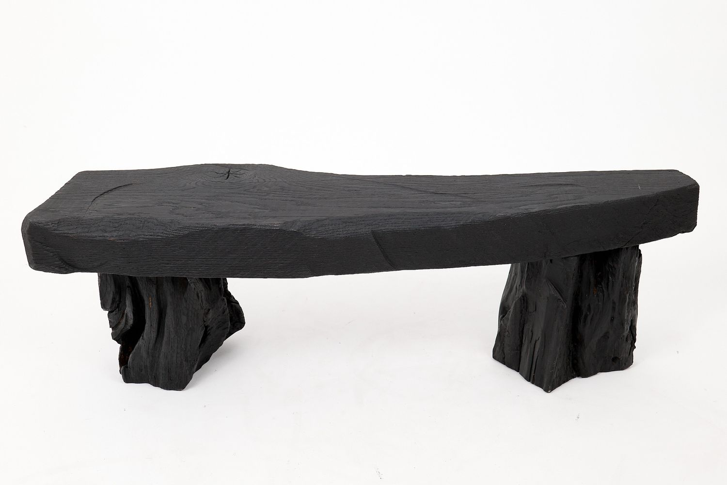 Jownik - Charred Wood Bench with Sculpted Trunk Legs Jownik - Charred Wood Bench with Sculpted Trunk Legs