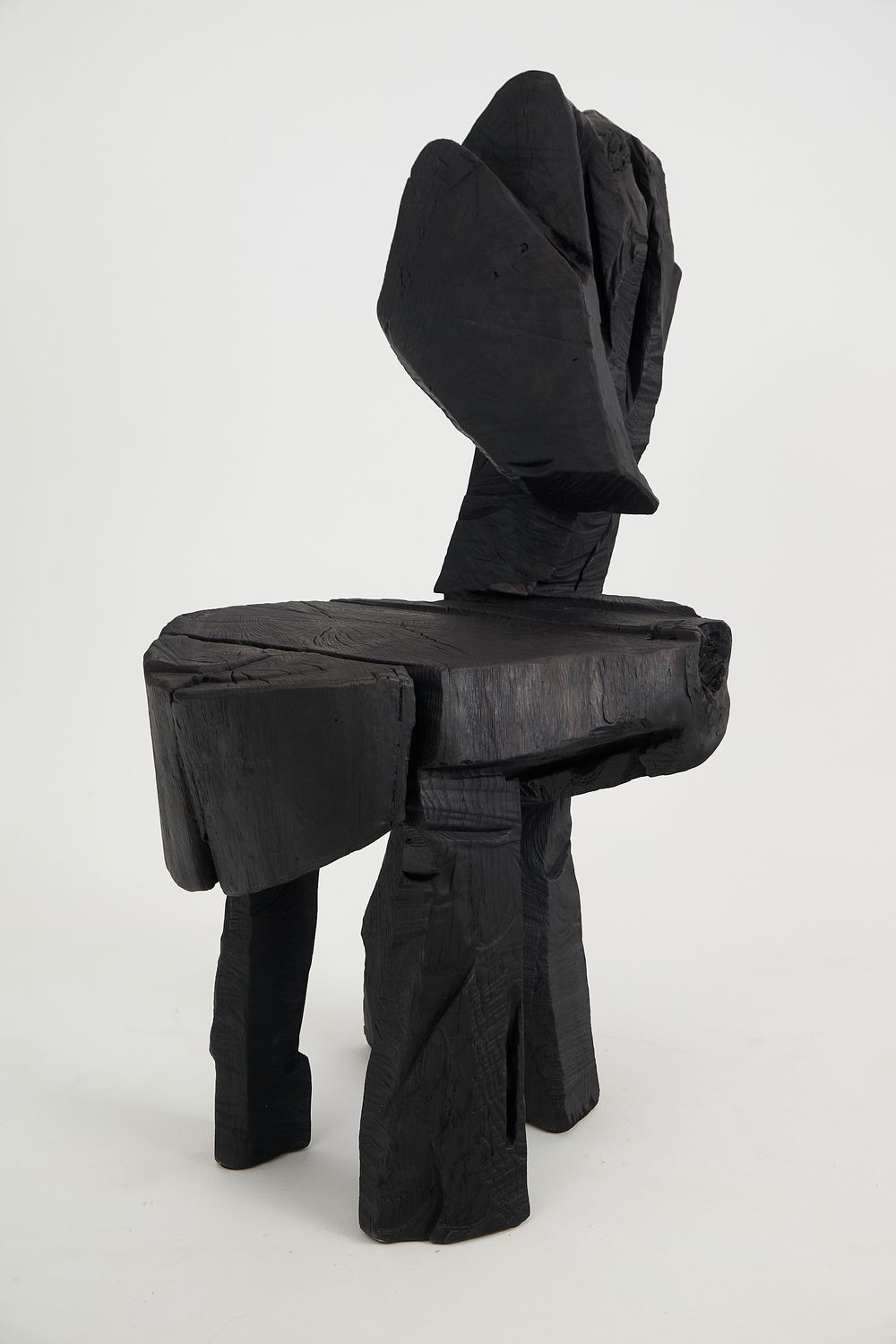 Jownik, Charred Sculptural Chair – Raw Presence Jownik, Charred Sculptural Chair – Raw Presence
