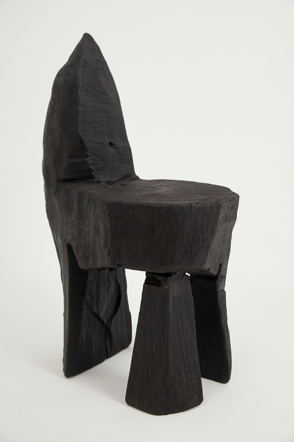 Jownik, Sculpted Charred Chair in Compact Form Jownik, Sculpted Charred Chair in Compact Form