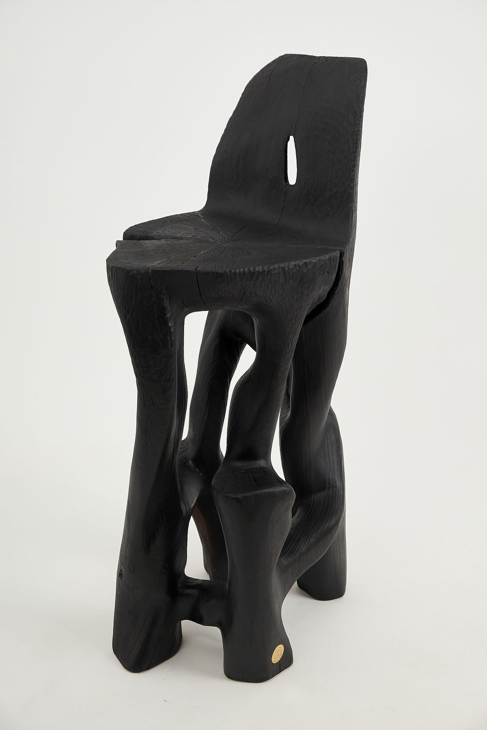 Makha, Charred High-Back Bar Chair – Carved Flow in Blackened Wood Makha, Charred High-Back Bar Chair – Carved Flow in Blackened Wood