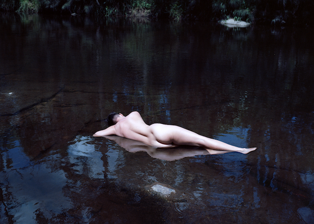 Woman in the river, Australia