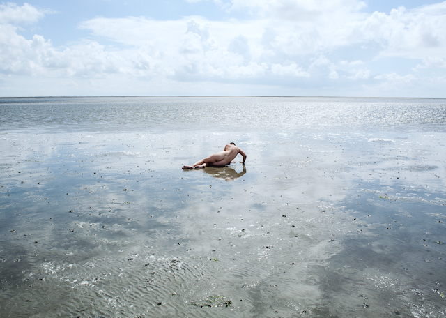 Woman in Wadden Sea, Denmark