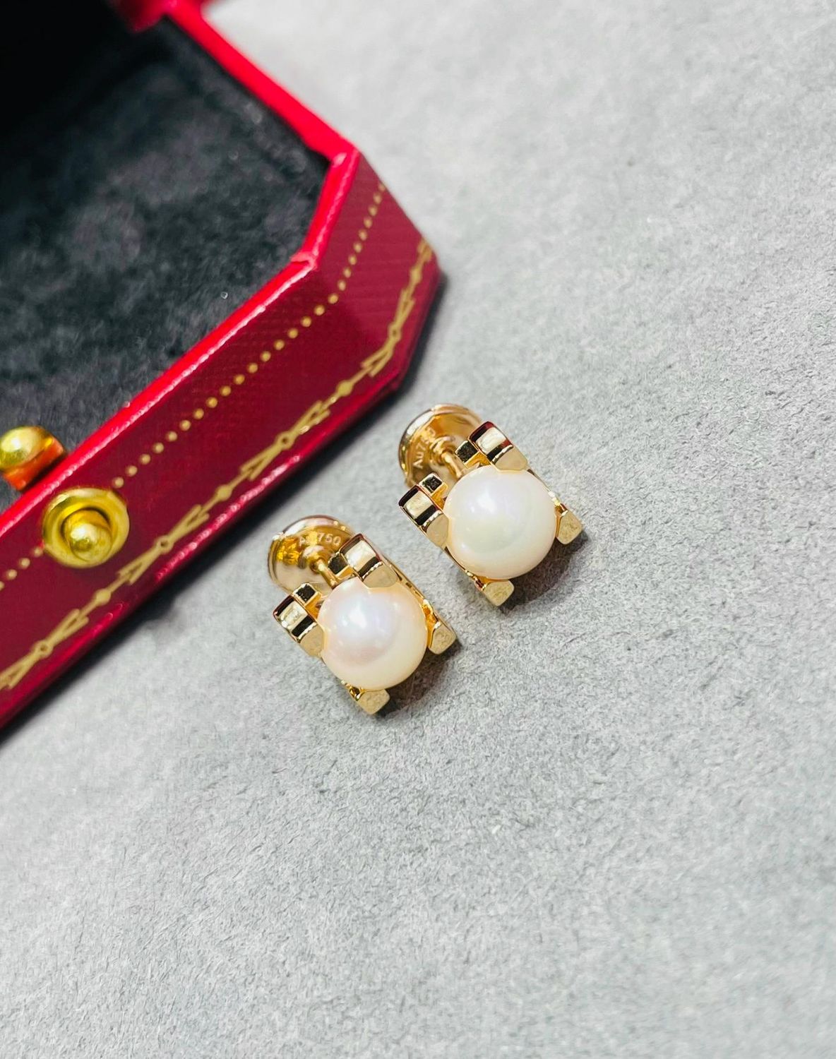 Modern Pearl Stud Earrings in Gold-Tone Geometric Setting