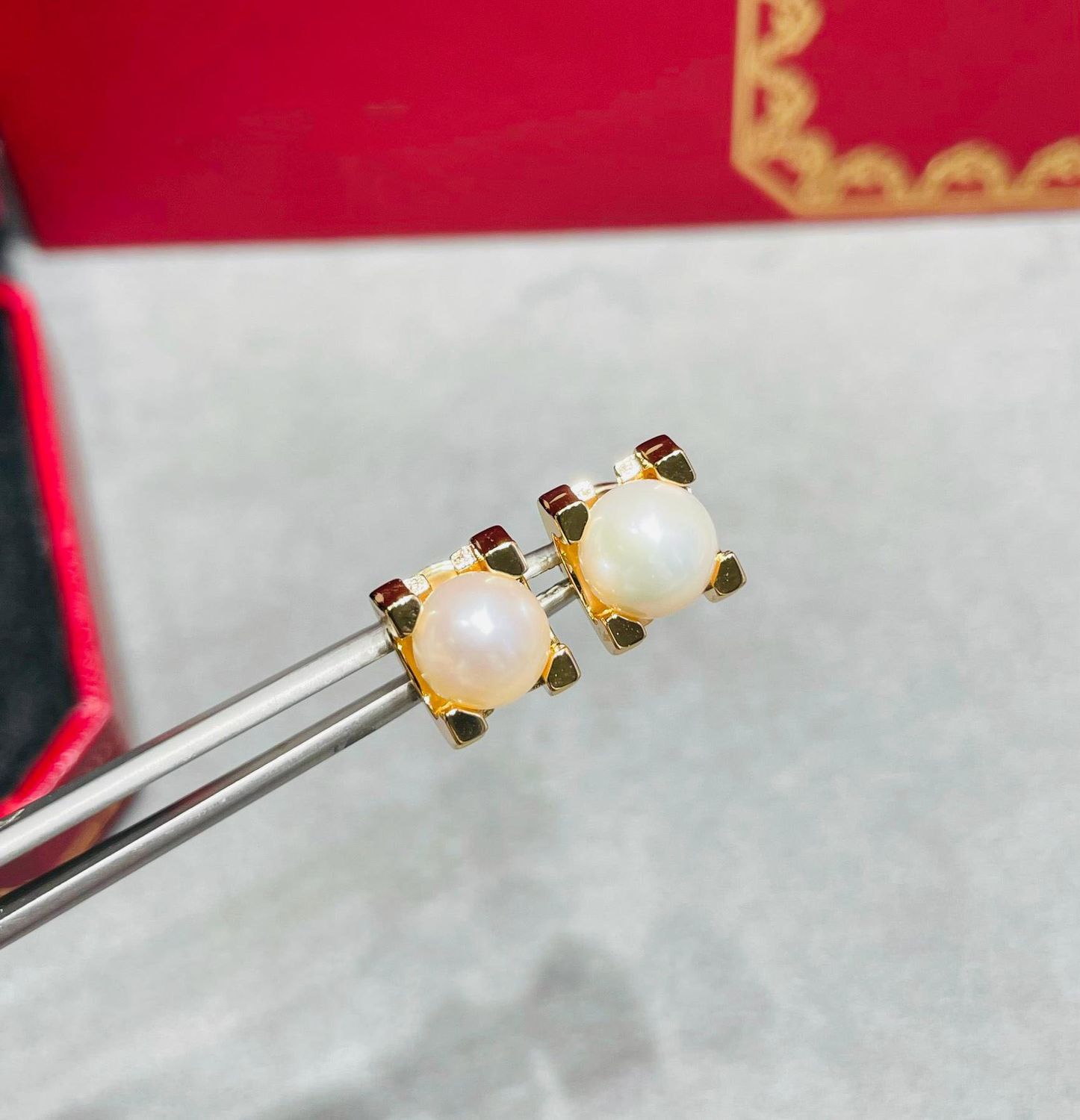 Modern Pearl Stud Earrings in Gold-Tone Geometric Setting