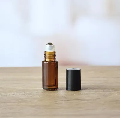 5ml Amber Thick Glass 16mm Neck Rollon with Metal Roller & Black Cap 5ml Amber Thick Glass 16mm Neck Rollon with Metal Roller & Black Cap