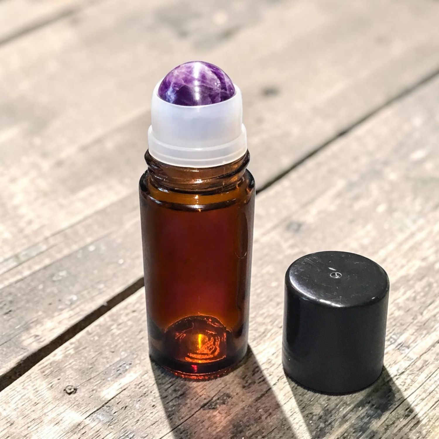 50mL AMBER GLASS ROLLER WITH Amethyst BALL &amp; BLACK CAP - SPECIAL BUY