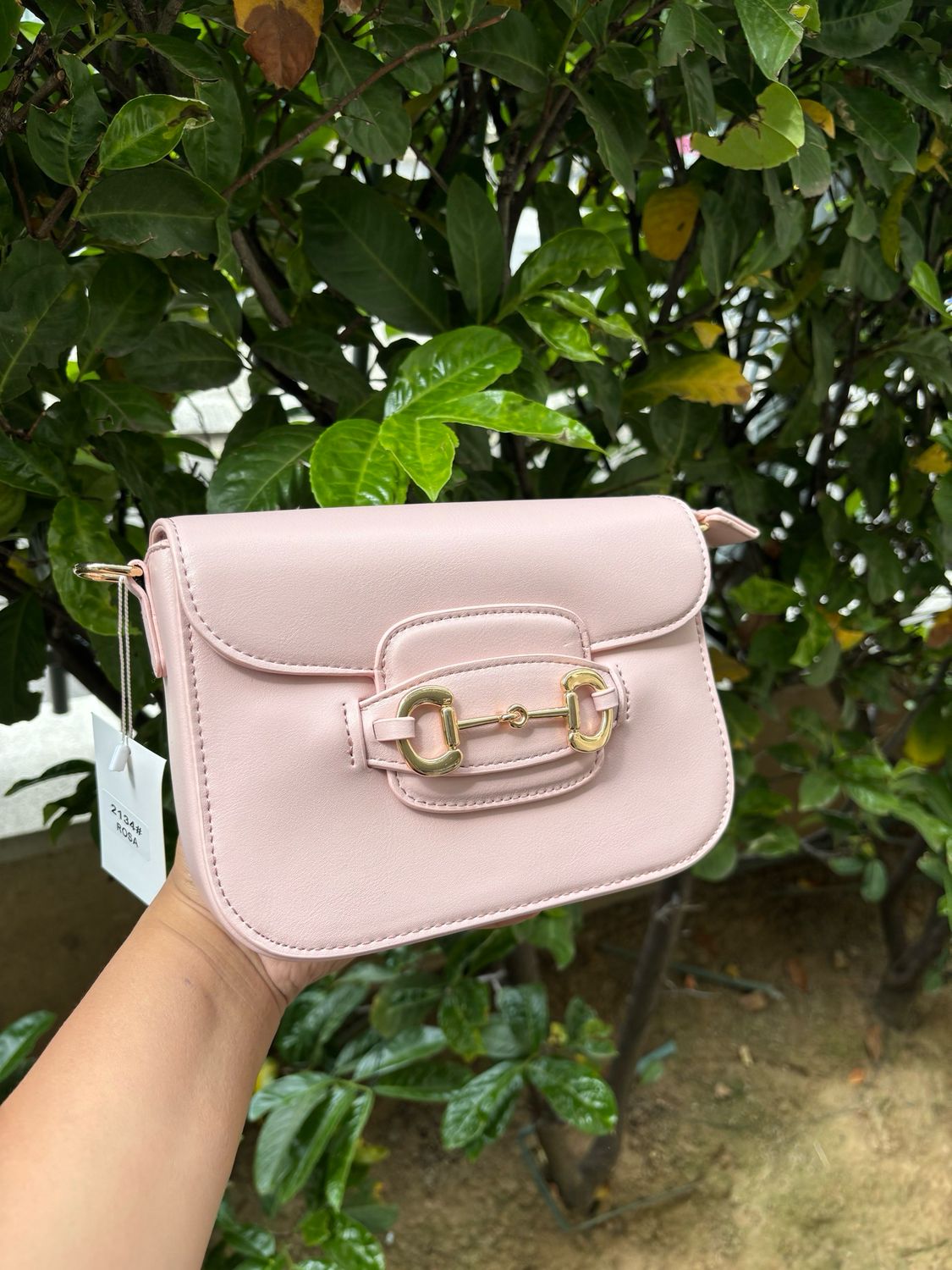 Sac rose clair avec 10 produits