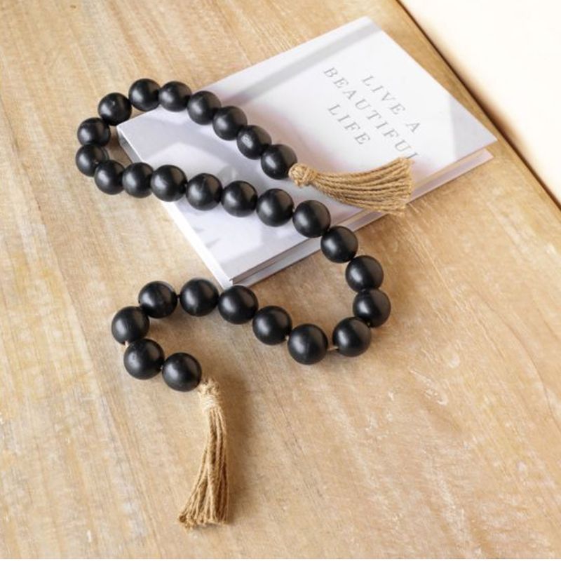 PDLA77  51" X 1.6" BLACK BEADS WITH JUTE TASSLES