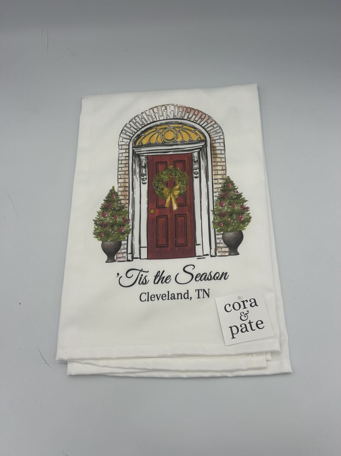 Cora and Pate Christmas Door Cleveland Tea Towel