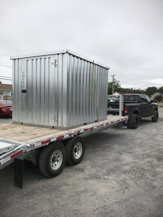 7'4" x 7'4" x 20' partial powder coated, double doors, elite lock, wheel receivers