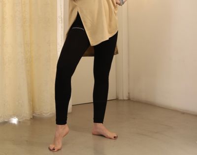 Leggings in bielastico a vita alta con cuciture sul retro • Muschio HINNOMINATE