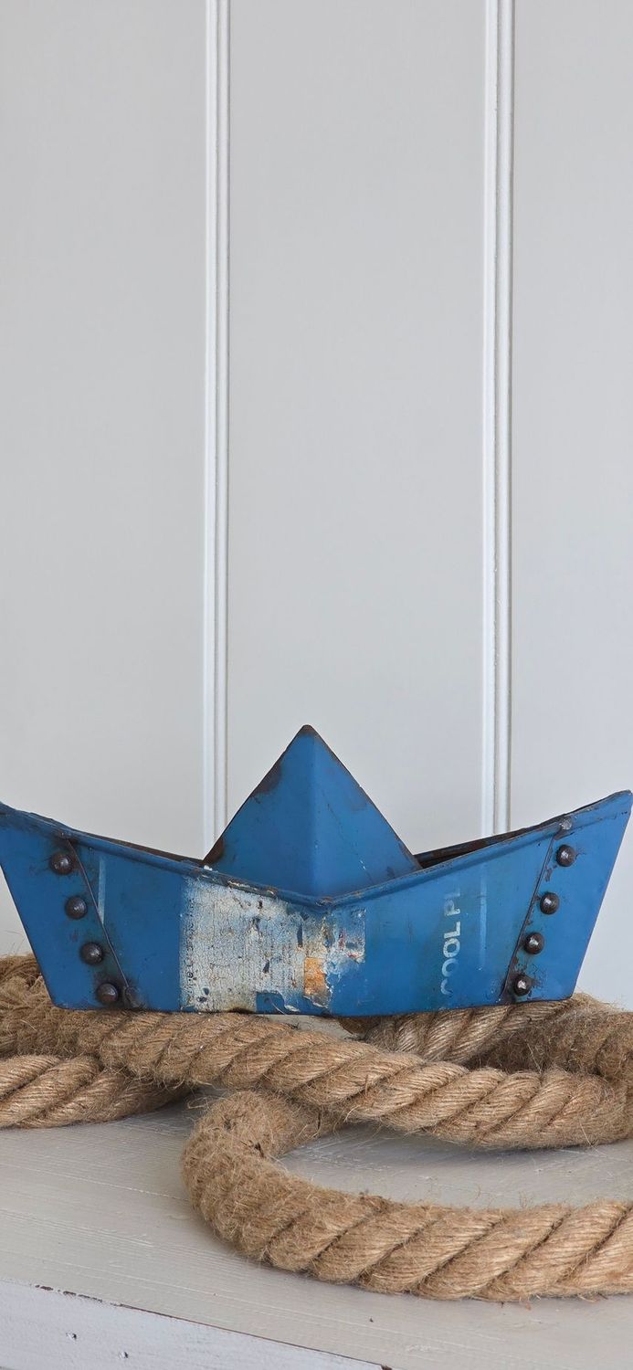 Metal paper boat in large