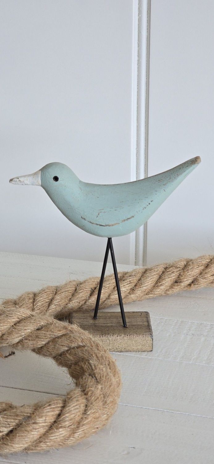 Standing wooden azure blue bird