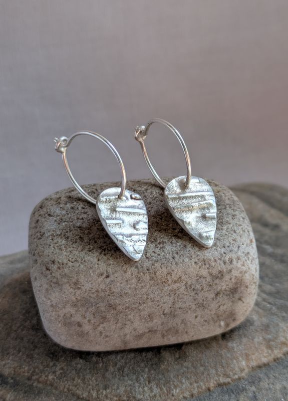 Small Hoops with Shield Charm