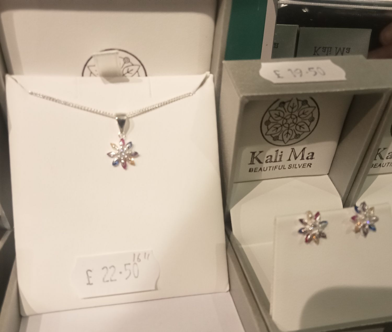 Kali Ma Sliver flower pendant with multi coloured cubic zirconia