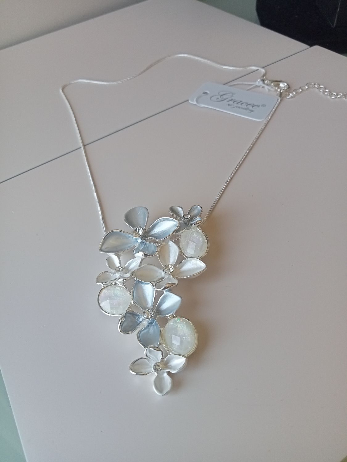 Delicate flower pendant