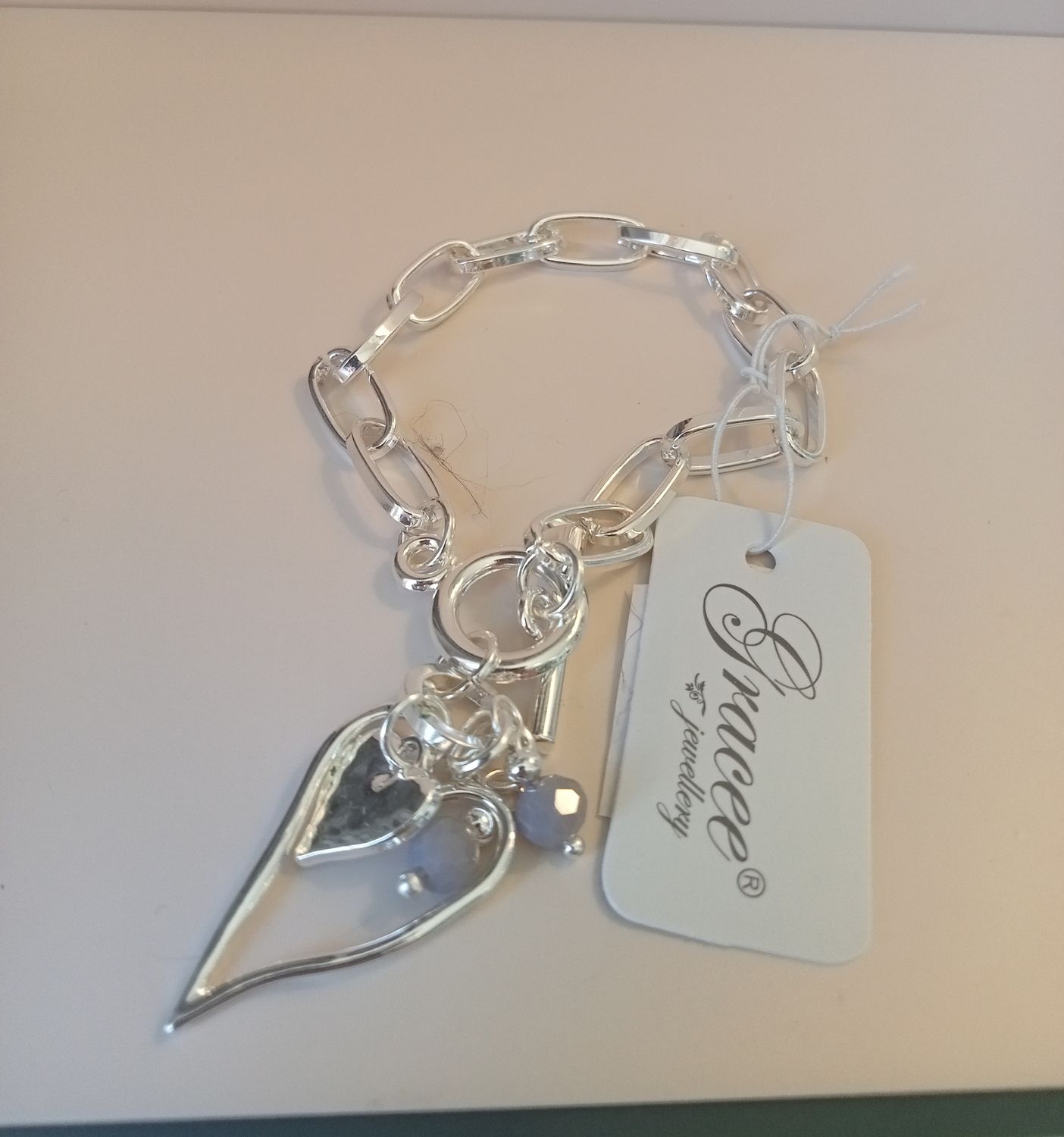 T Bar fastening Oval link multiple heart bracelet