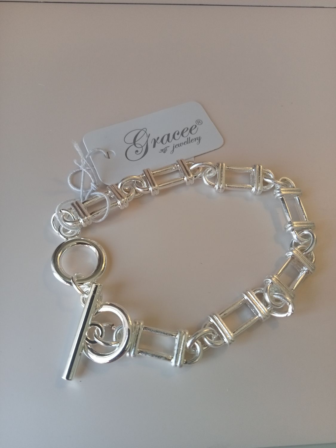 T Bar fastening unusual link bracelet