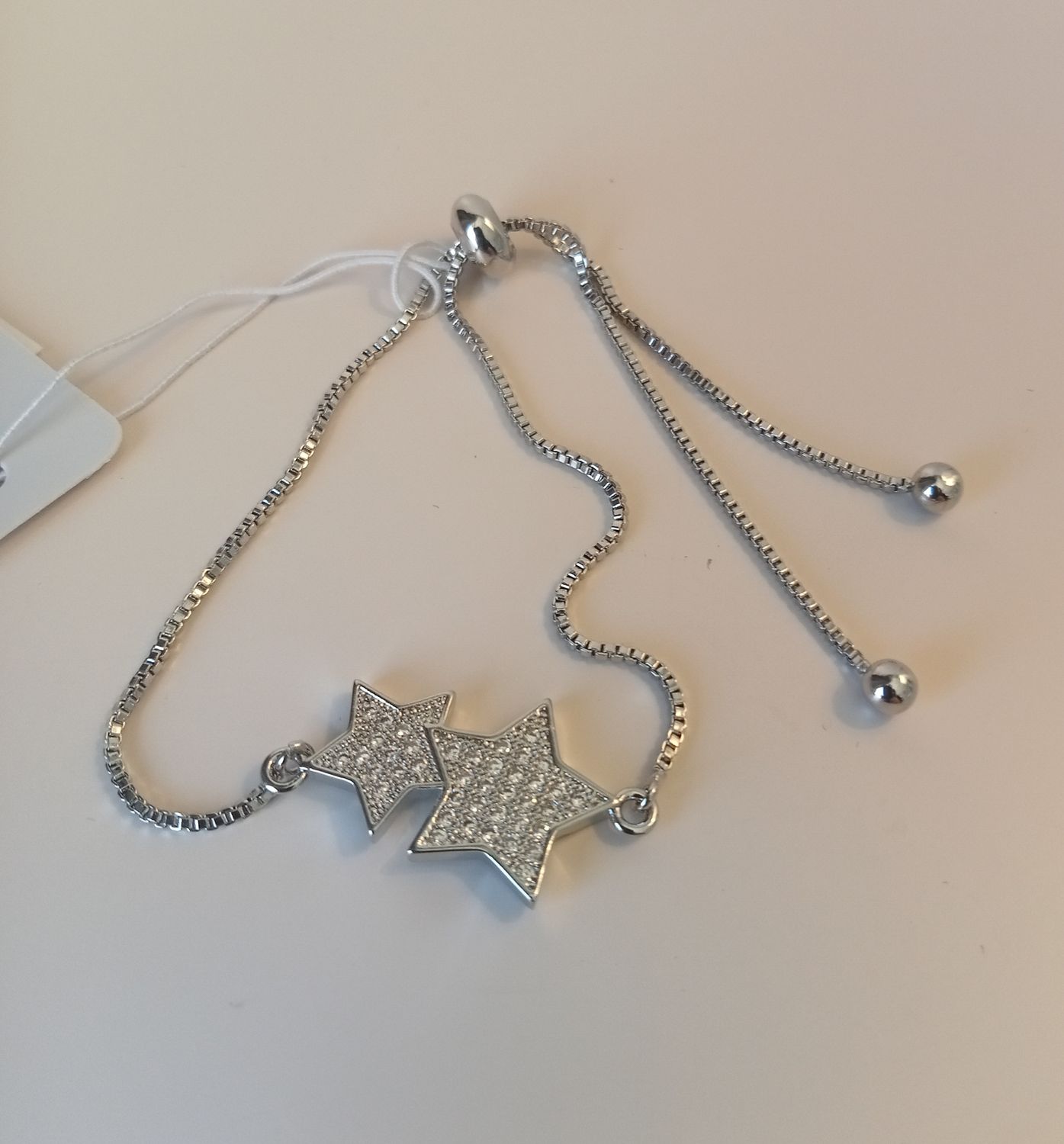 Adjustable bracelet with two stars