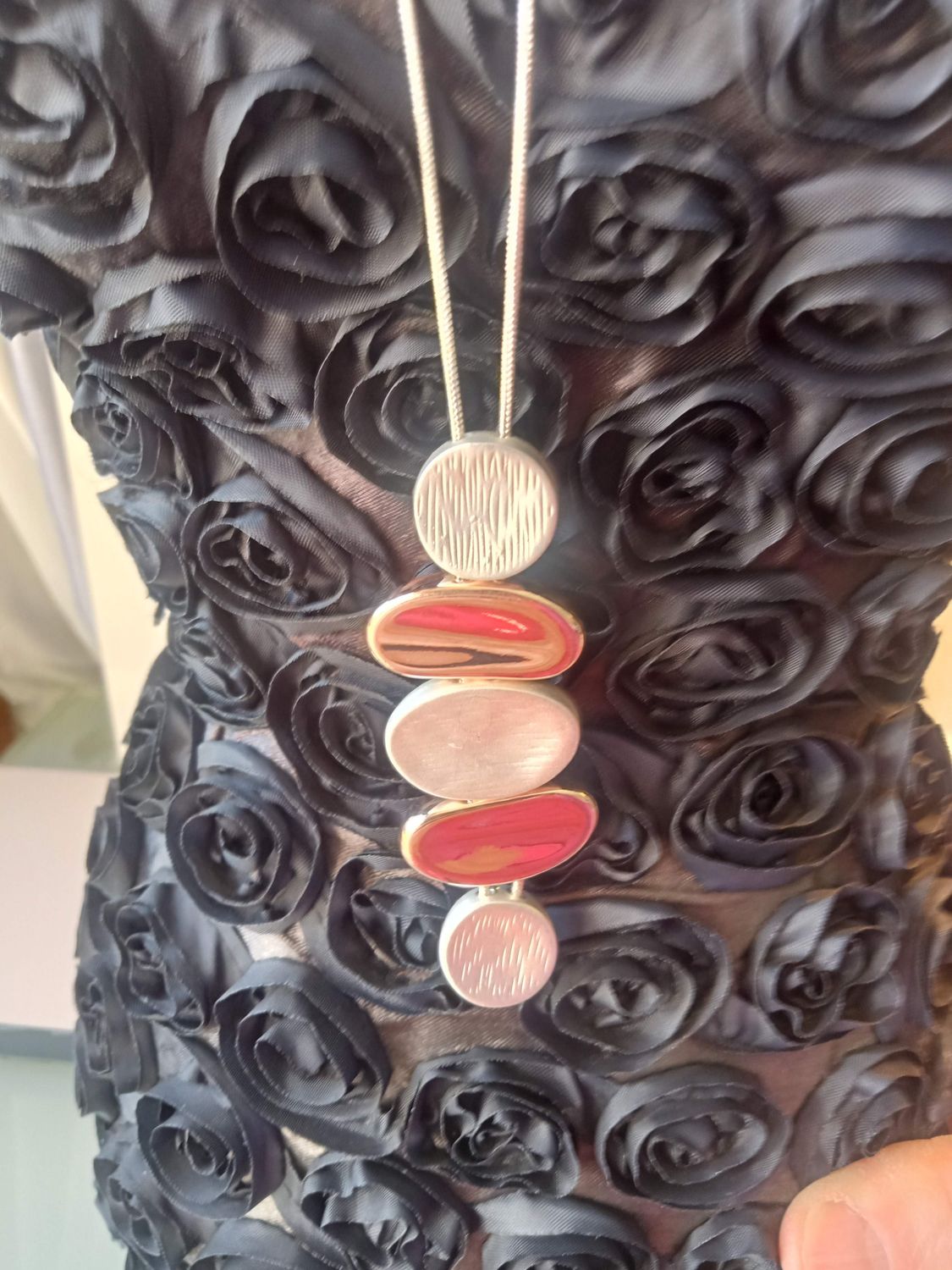 Two tone long lozenge shaped pendant
