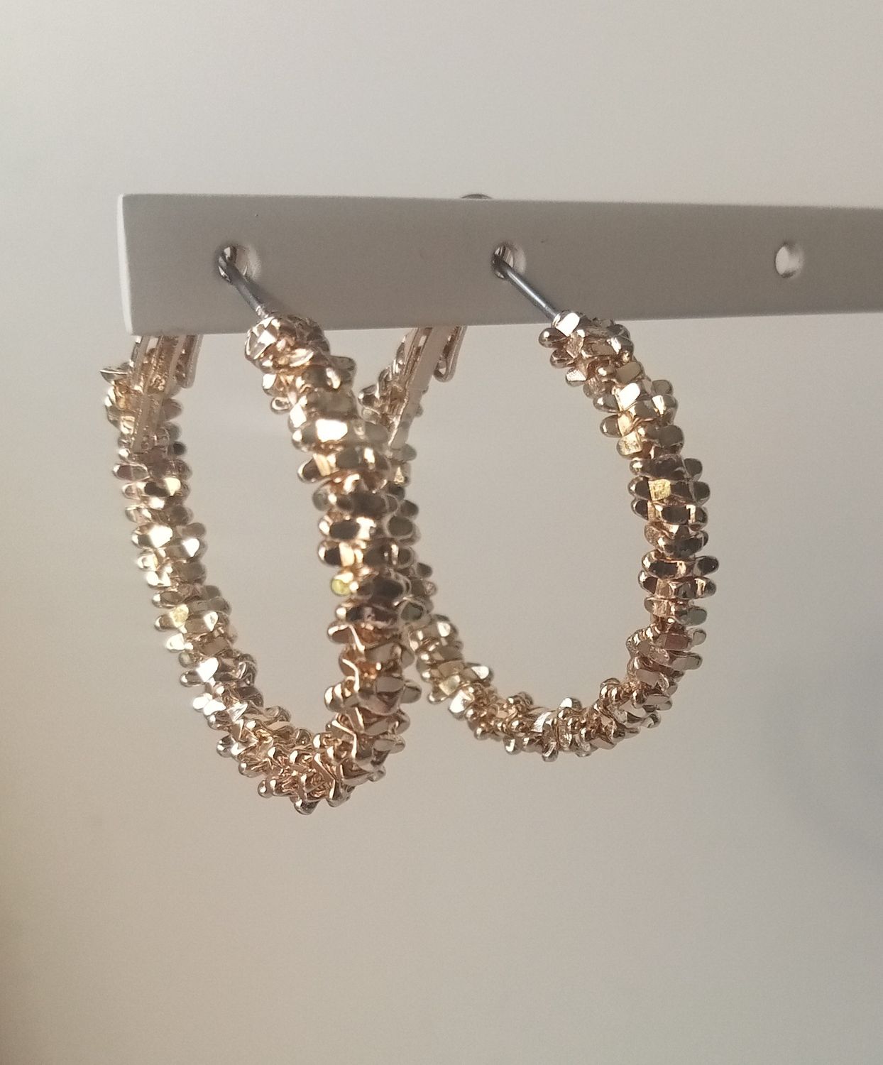 Gold tone hoop earrings