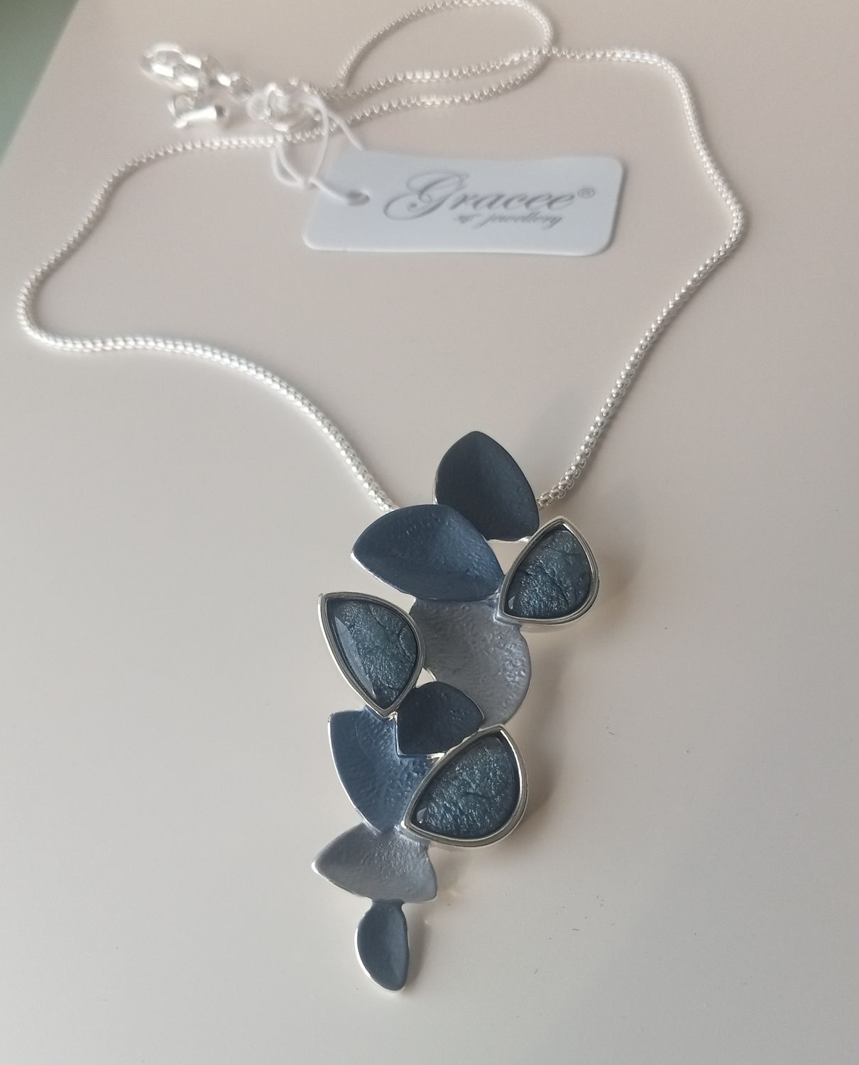 Shades of blue multi shaped pendant