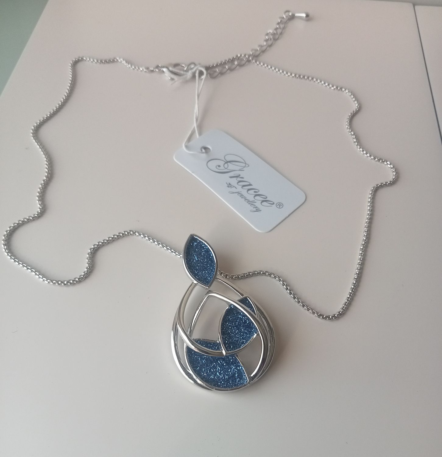 Unusual shaped necklace with blue stones