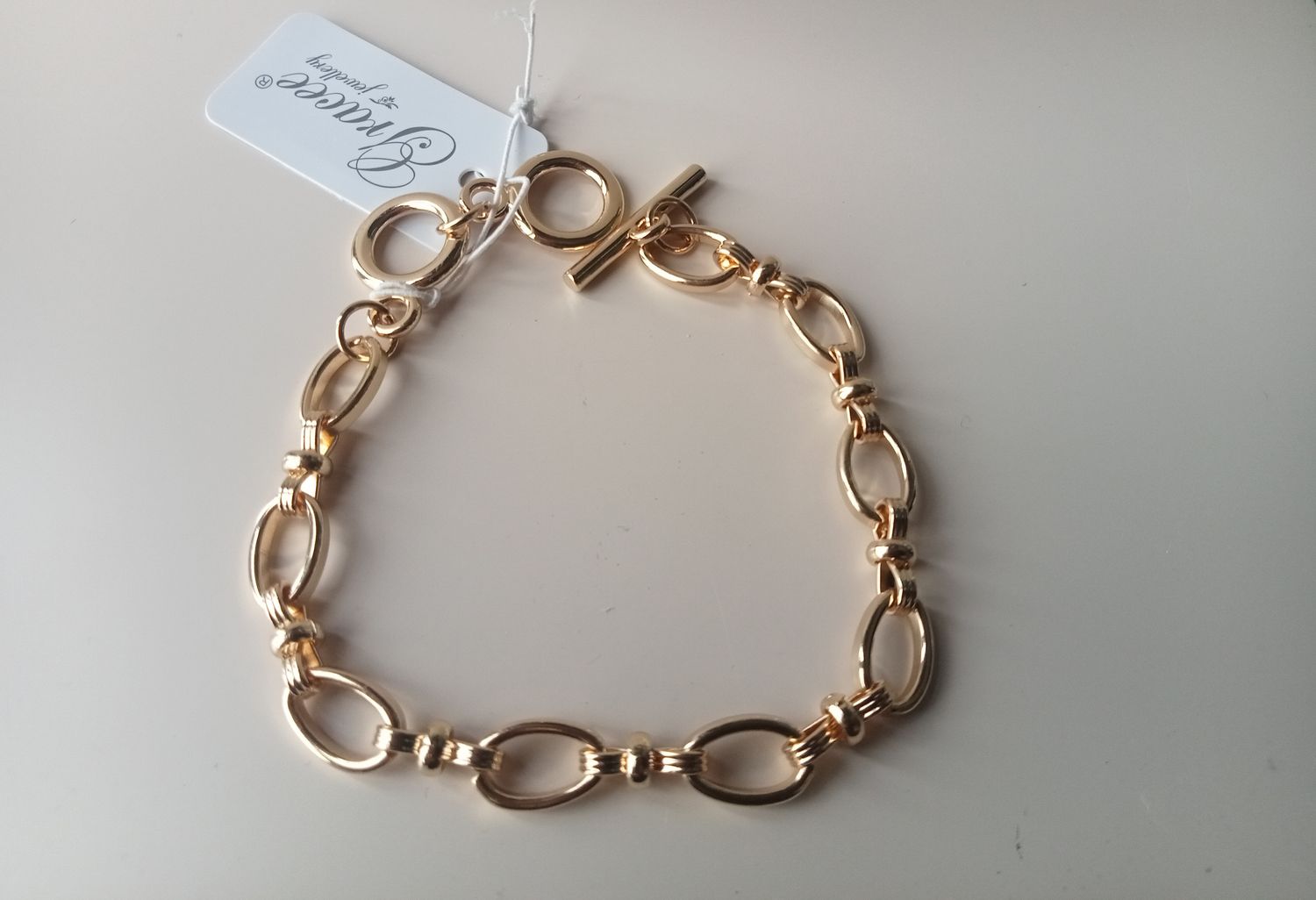 Fancy Link gold tone bracelet
