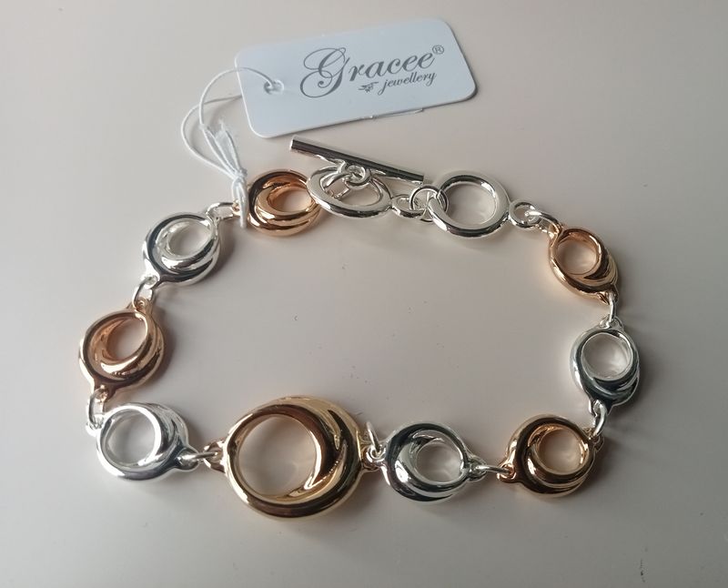 Gold and silver tone circle bracelet