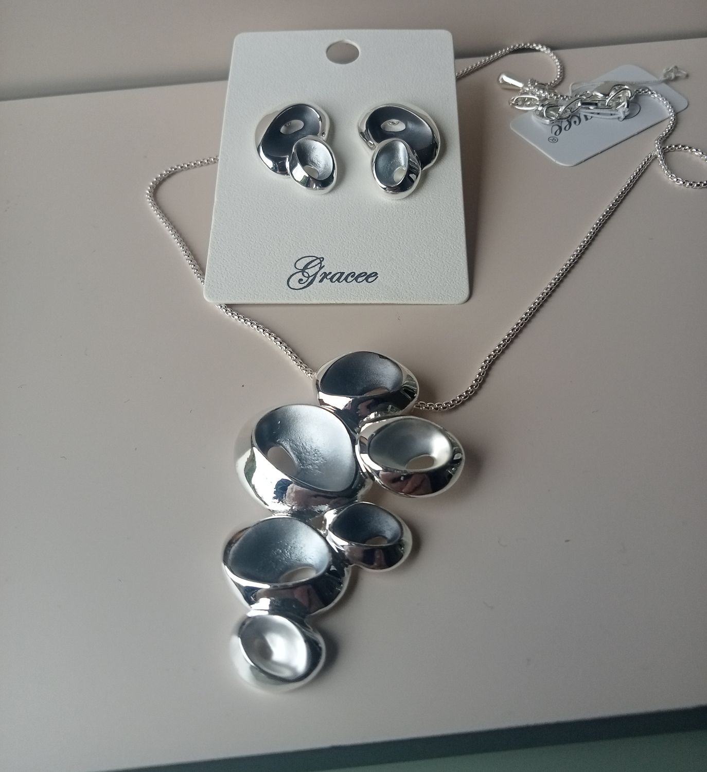 Silver tone and pale blue earrings