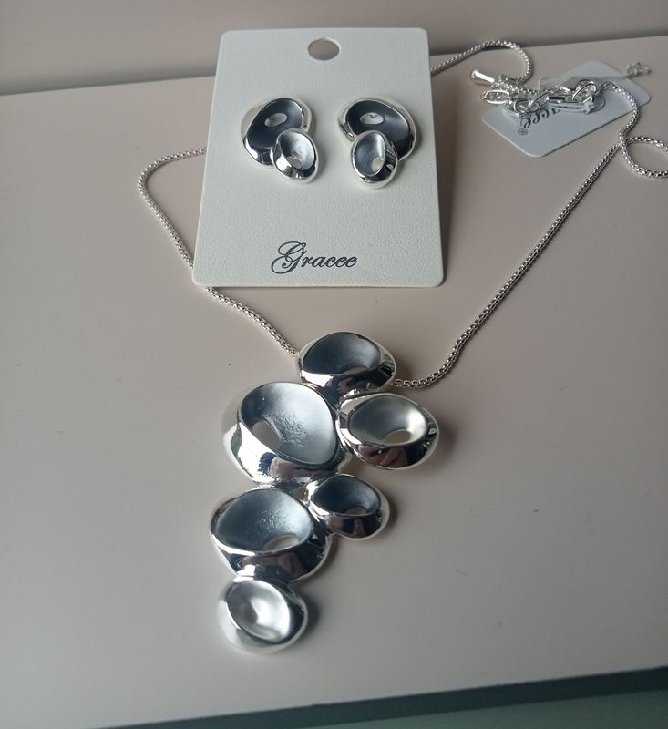 Silver tone and pale blue earrings