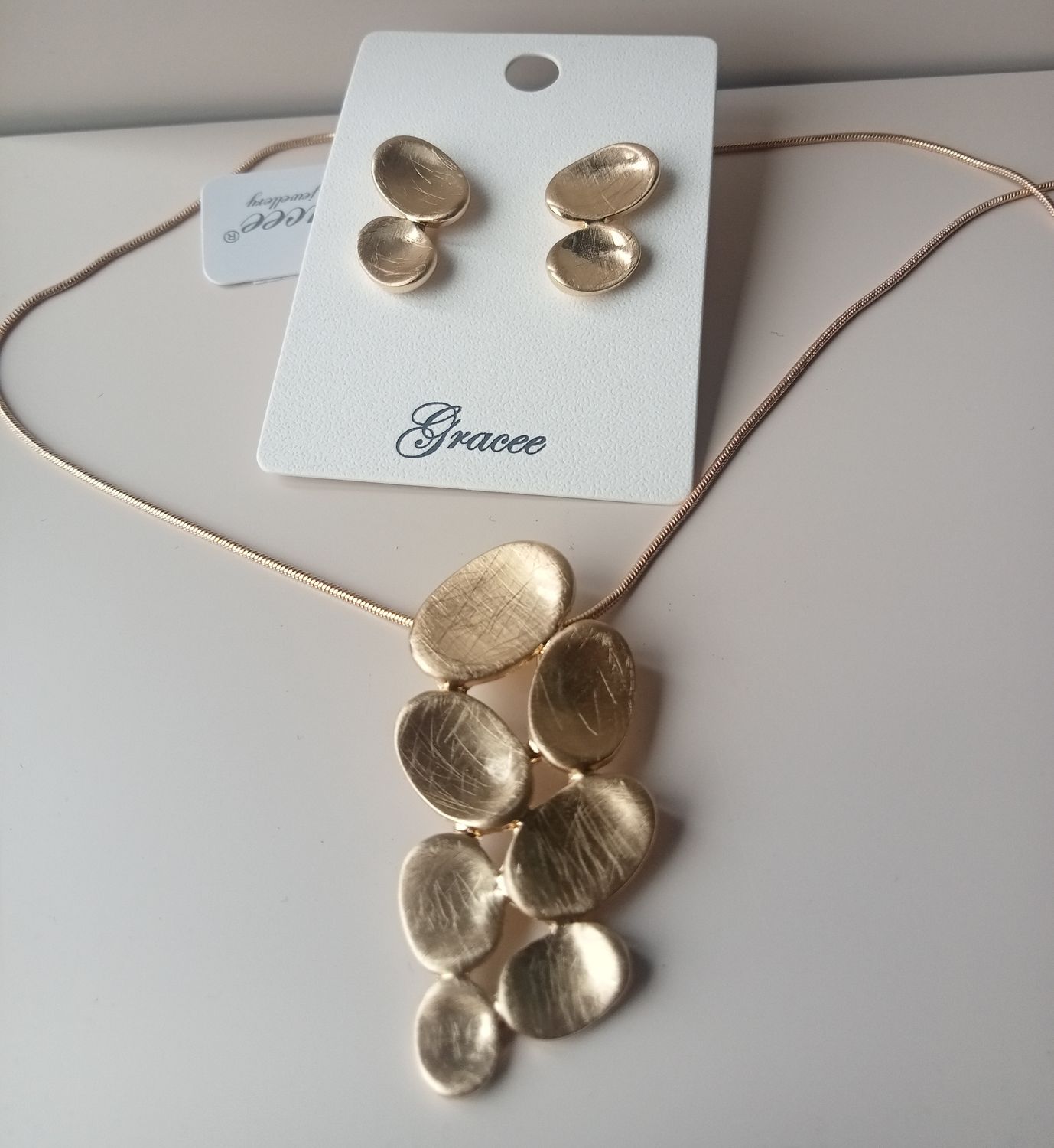 Gold tone Pebble Pendant