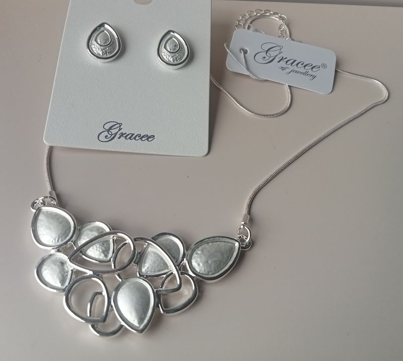 Silver tone teardrop shaped earrings