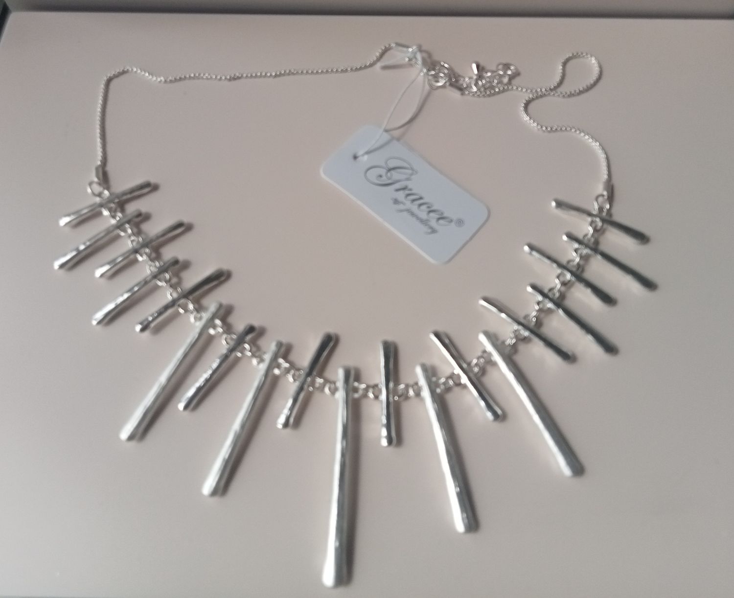 Silver tone spiked necklace