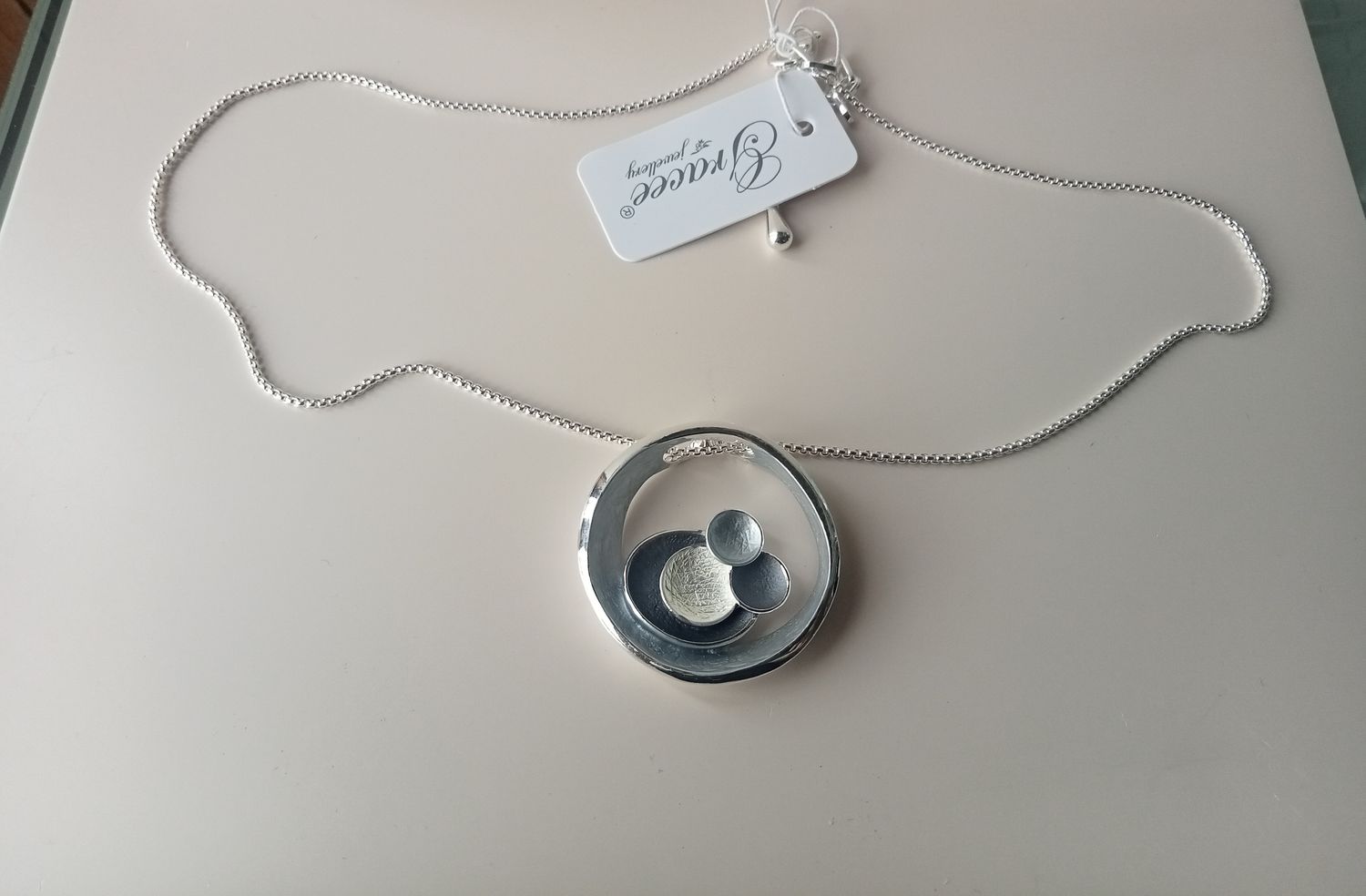 Circle pendant with 4 circles inside