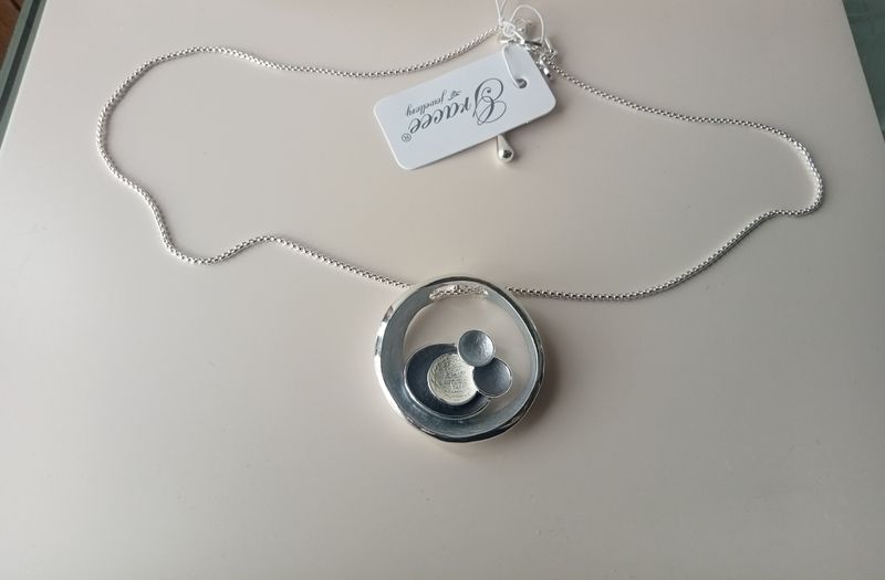 Circle pendant with 4 circles inside
