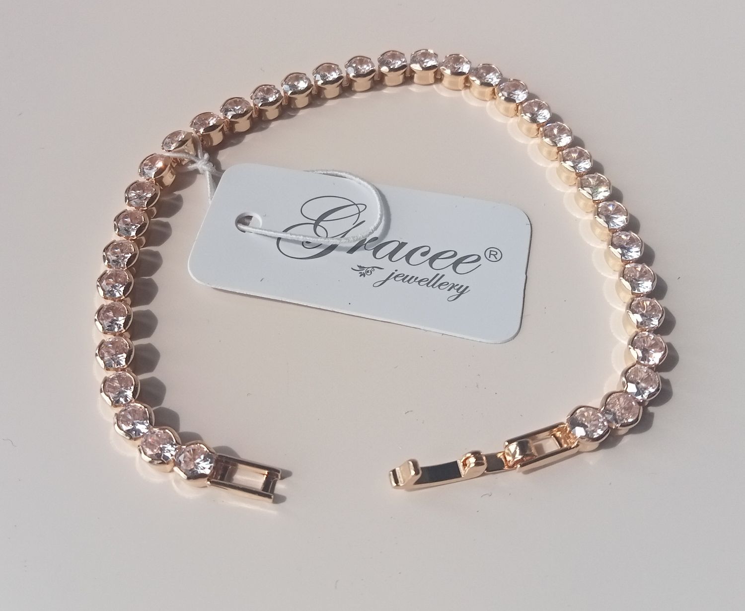 Gold tone tennis bracelet