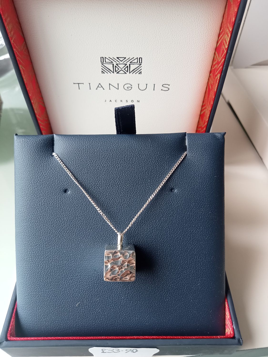 Cube shaped Sterling Silver necklace hammered on one side