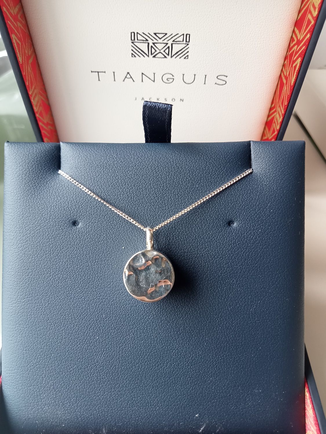 Chunky silver round hammered pendant