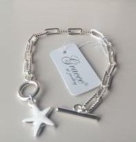 Fancy link T Bar bracelet with star charm