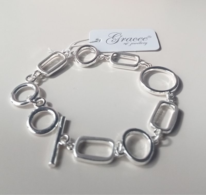 T Bar fastening chunky bracelet with round and rectangular links