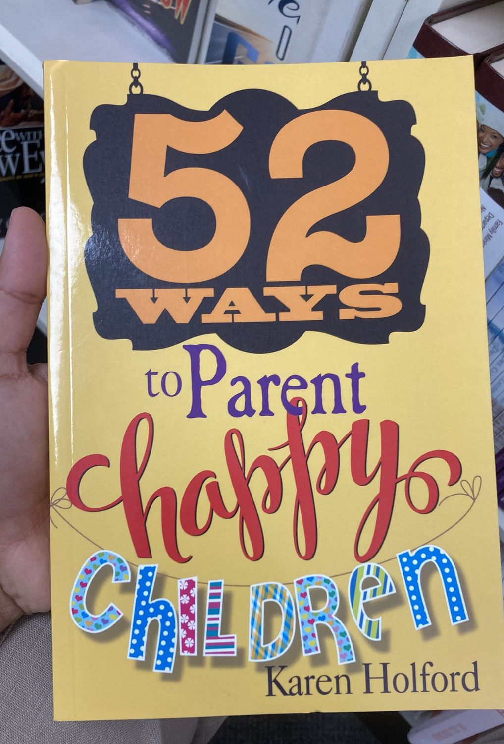 52 Ways to Parent Happy Children.