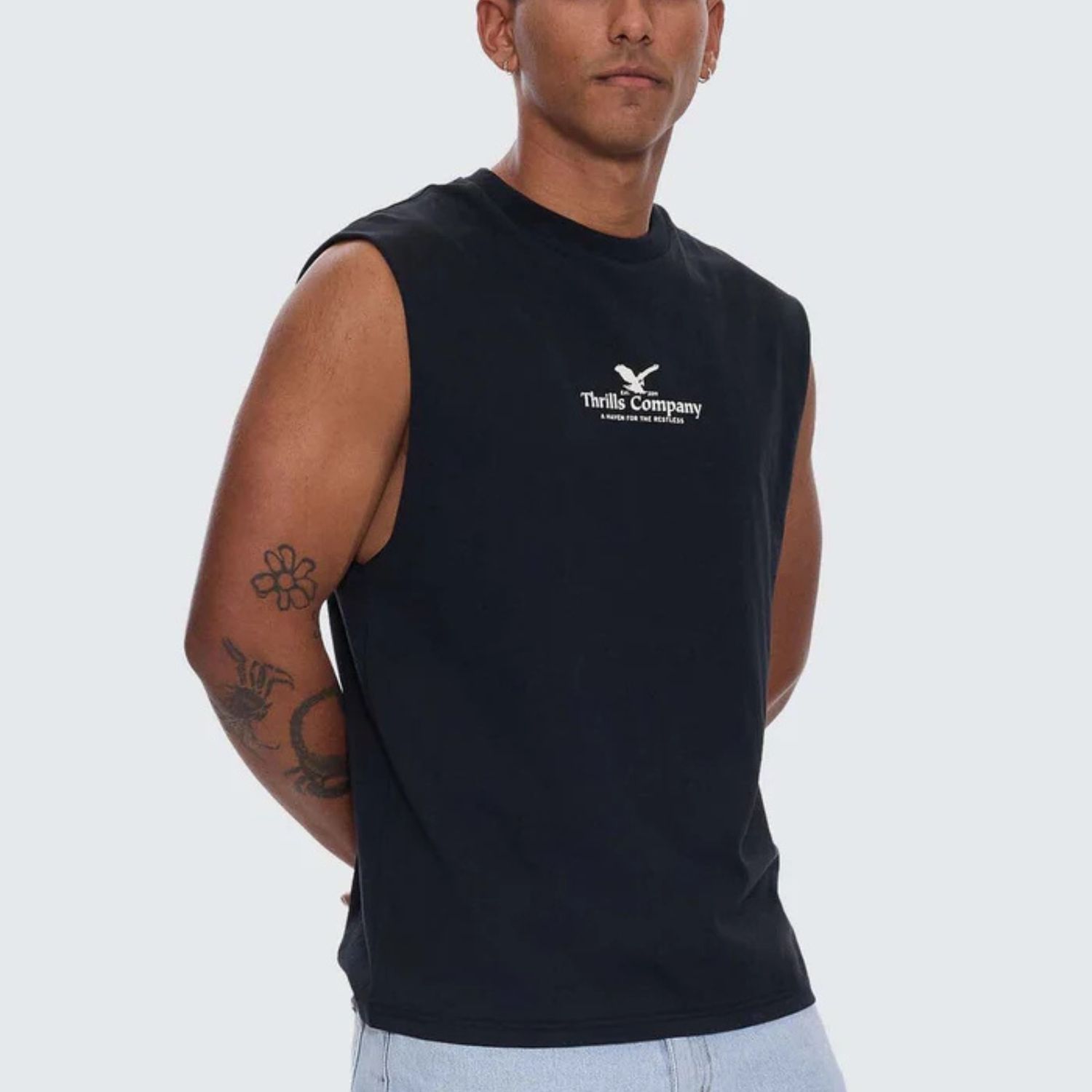 THRILLS MENS A HAVEN FOR THE RESTLESS MERCH FIT MUSCLE TEE - WASHED BLACK